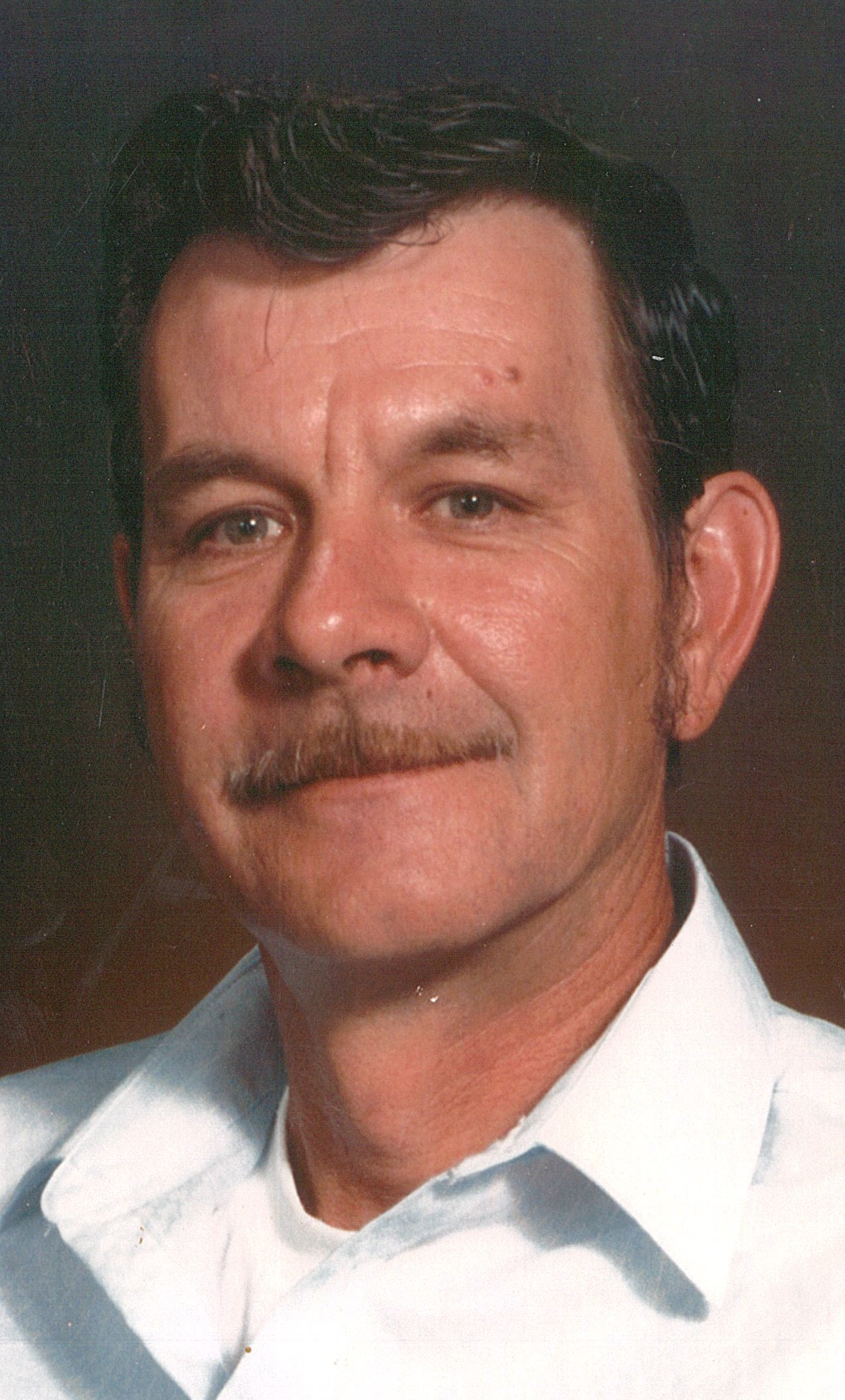 Johnny  L. White